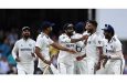 The Indian players celebrate after winning the final Test