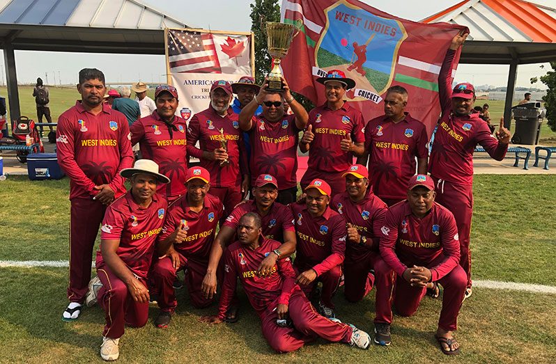 The victorious West Indies Over-50s celebrate their win.