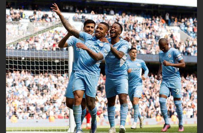 Manchester City's Gabriel Jesus celebrates with teammates after scoring their fourth goal to complete his hat-trick (Action Images via Reuters/Jason Cairnduff)