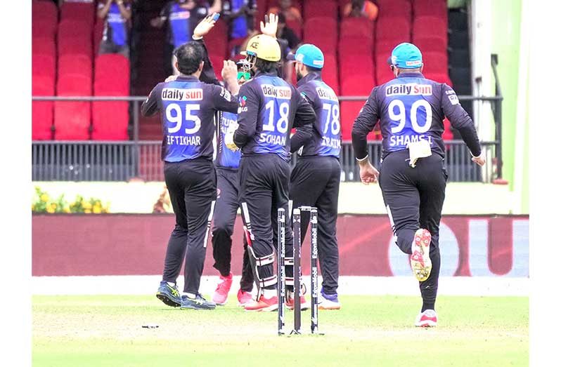 Defending Champs Rangpur Riders celebrate their 8- run win over Dubai Capitals yesterday and a place in tomorrow’s Final (Yohan Savory photo)