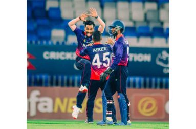 The Nepal players celebrate