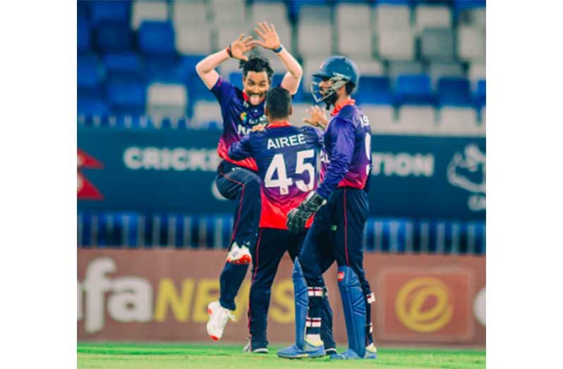 The Nepal players celebrate