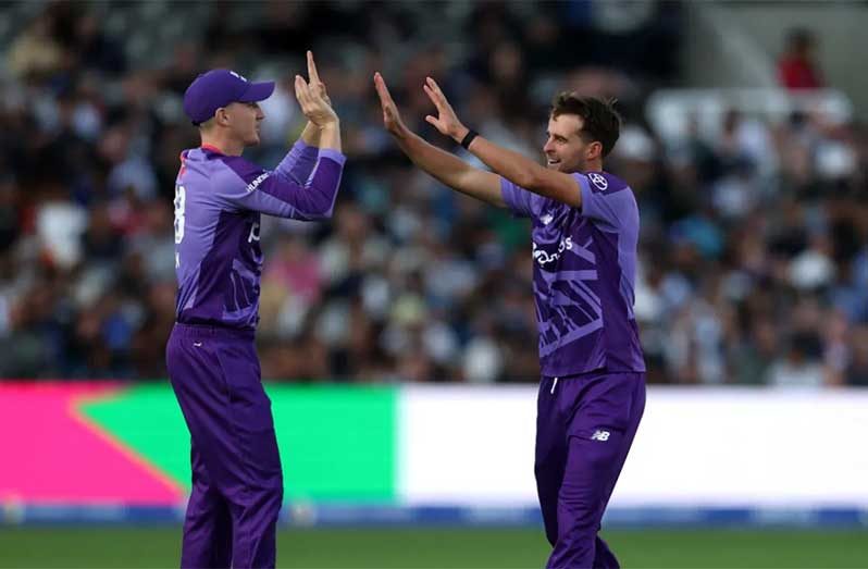 Tom Lawes and Harry Brook celebrate the wicket of Jamie Smith  • ( Getty Images)