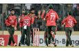 Tanzim Hasan Sakib made it five down in the powerplay • AFP/Getty Images