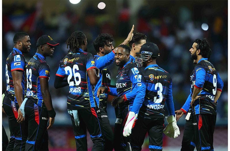 Antigua & Barbuda Falcons players celebrate the wicket of Darren Bravo of Trinbago Knight Riders during the Men’s 2025 Republic Bank Caribbean Premier League match between Antigua & Barbuda Falcons v Trinbago Knight Riders at Sir Vivian Richards Cricket Ground on Wednesday night.