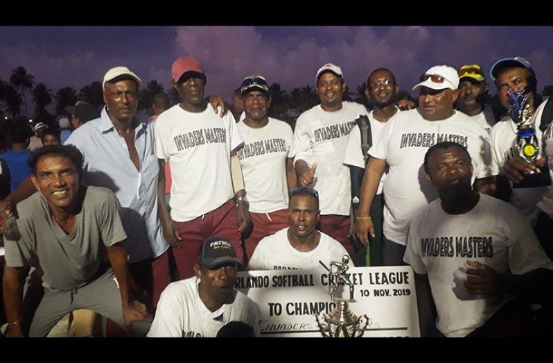 Invaders Masters celebrate with supporters..MVP Ramesh Narine is at left..