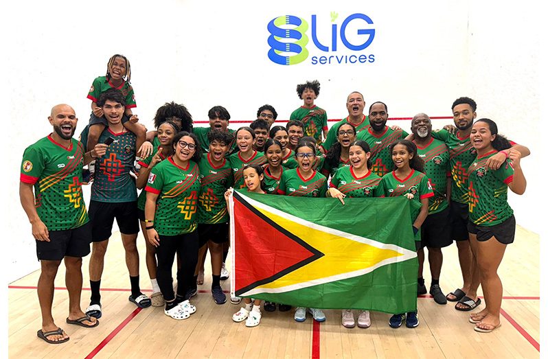 The victorious Guyana celebrate their first Junior CASA title since 2022. GSA President David Fernandes (5th from right) and Coach Carl Ince (3rd from right)