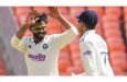 Player-of-the-Match Ravendra Jadeja (left) and India captain Shubman Gill celebrate the fall of another West Indian wicket.