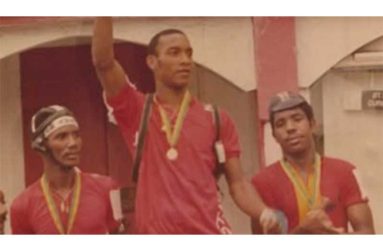 Jean Louis (centre) celebrates after winning the Ovaltine race in St. Kitts & Nevis in 1986 (Photo courtesy Saint Lucia Cycling Association)