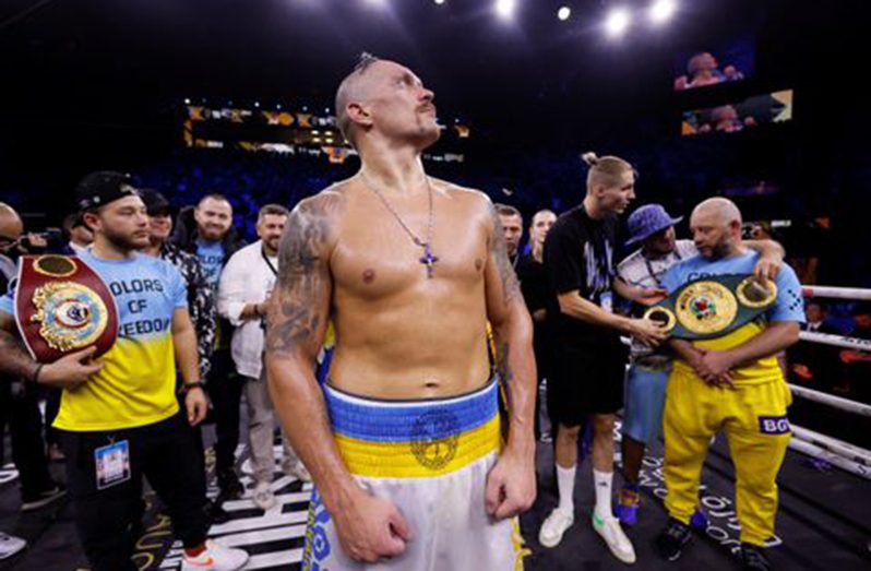 Oleksandr Usyk celebrates winning the fight against Anthony Joshua Action Images via Reuters/Andrew Couldridg