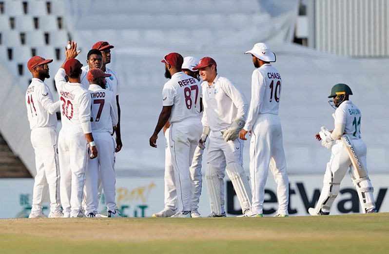 Alzarri Joseph celebrates with his team after removing Temba Bavuma (Feb 28, 2023•AFP/Getty Images)