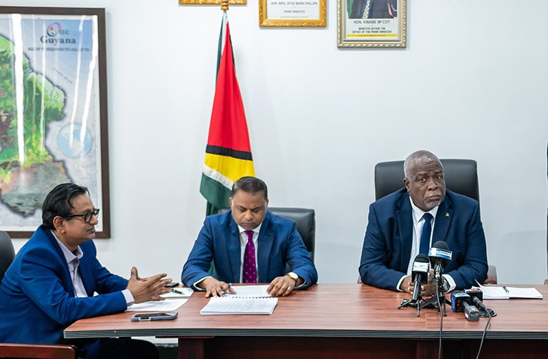 Prime Minister Brigadier (Retíd) Mark Phillips; Minister within the Ministry of Public Works Deodat Indar; and Head of GPLís Management Committee Kesh Nandlall at the signing ceremony on Friday