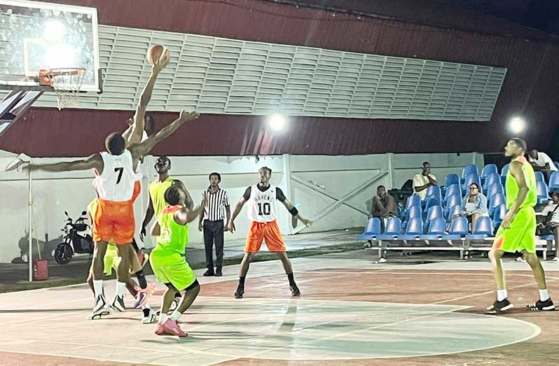 Champions North Ruimveldt Ravens in battle with Pacesetters during the One Guyana Basketball League.