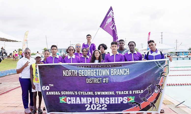 Champions again! North Georgetown celebrate their victory in the  pool.