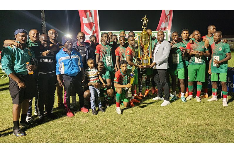 GDF, champions of the GFF/KFC Elite league cup celebrate with their trophy.