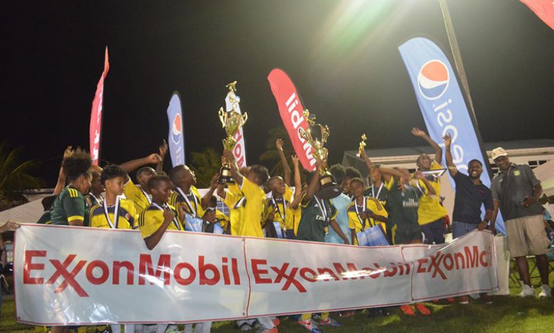 The winning Charlestown  Secondary School teams celebrate their double win