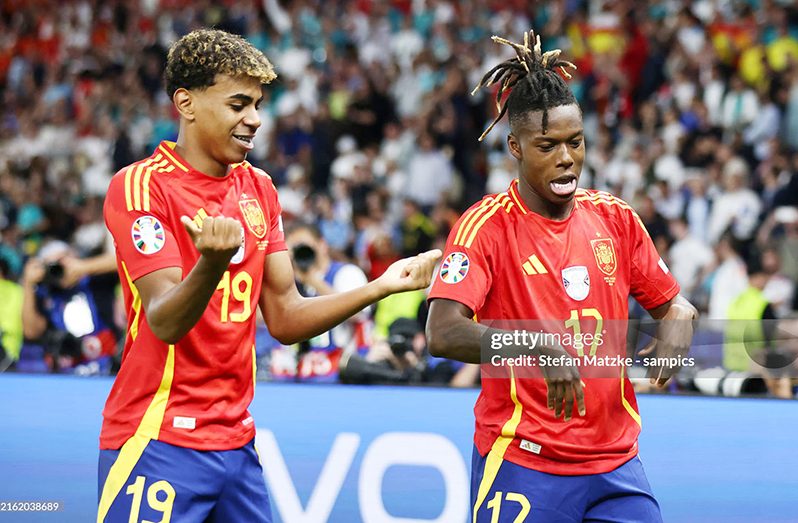 Nico Williams of Spain celebrates as he scores the goal 1:0 with Lamine Yamal of Spain during the UEFA EURO 2024 final match between Spain and England at Olympiastadion on July 14, 2024 in Berlin, Germany. (Photo by Stefan Matzke - sampics/Getty Images)