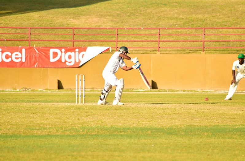 Shivnarine Chanderpaul drives through the offside during his innings of 91. (Adrian Narine photo)