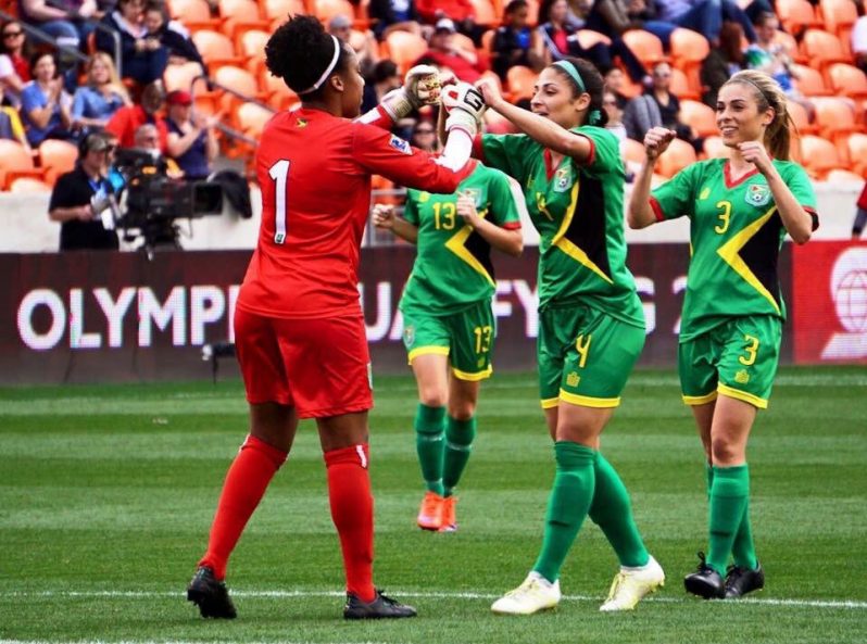 FLASHBACK: Guyana’s Chantel Sandiford is congratulated by sisters Kayla and Briana De Souza after pulling off a great save in their 2-1 win over Guatemala at the 2016 CONCACAF Women’s Olympic Qualifier tournament at the BBVA Compass Stadium in Houston, Texas.