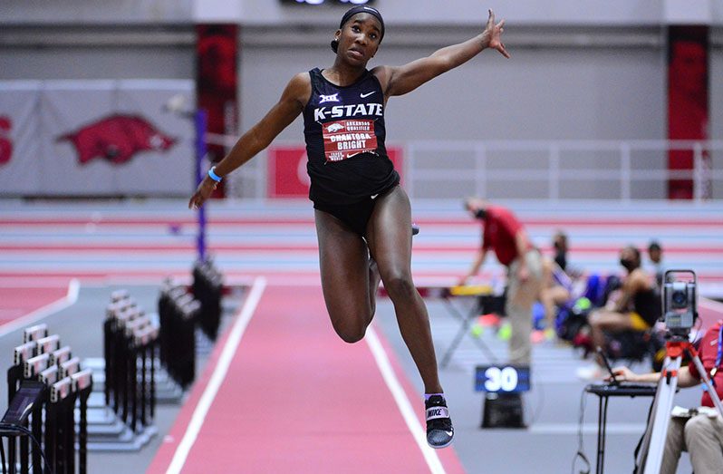 Taking flight! Chantoba Bright in action in the long jump for Kansas State
