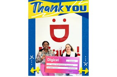 Gabriella Chapman (left), Digicel’s Communications Manager handing over the sponsorship cheque to Jordana Ramsay- Gonsalves, Event Organiser.