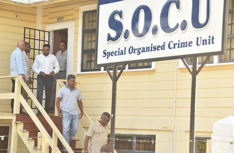 Exiting SOCU: Former GRDB head Ricky Ramraj, PPP Parliamentarian Nigel Dharamlall, former GRDB board member Badrie Persaud and former GRBD General Manager Jagnarine Singh after questioning at SOCU