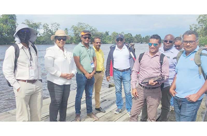 Regional Chairperson, Vilma De Silva (second from left), with Regional Vice Chairman, Humace Oodit; Prime Minister Representative, Arnold Adams, along with engineers from the Ministry of Public Works and Sea Defence on site