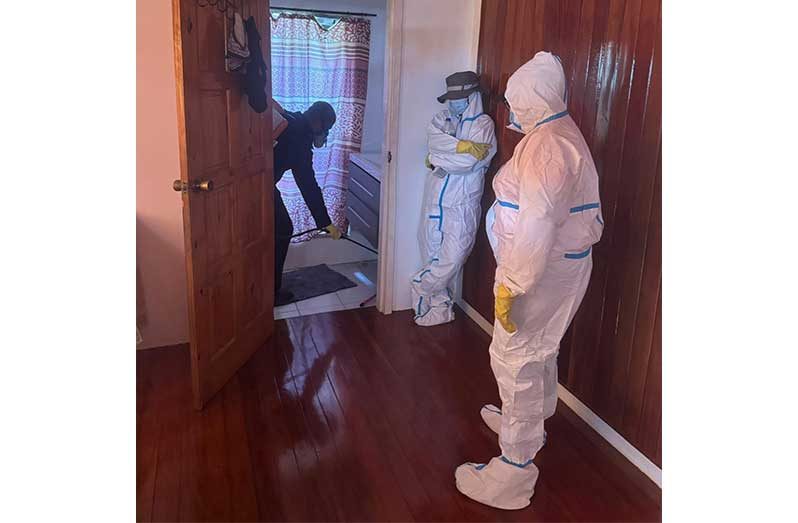 The vector control team in one of the many homes visited in and around Charity