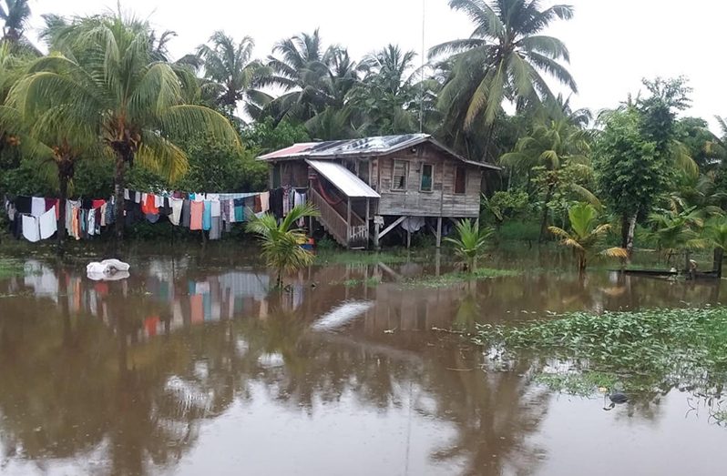 An inundated house at Charity