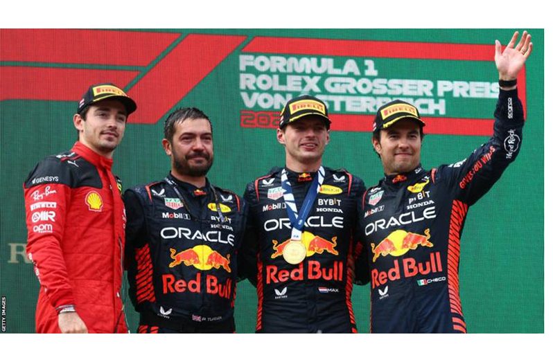 Charles Leclerc (left) finished third behind Red Bull's Sergio Perez (right) and race winner Max Verstappen (centre, right) at the Belgium Grand Prix before the summer break