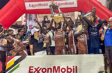 Chase Academic Foundation after collecting the winning trophy from ExxonMobil’s Community Relations Manager Suzie DeAbreu (left in Blue)