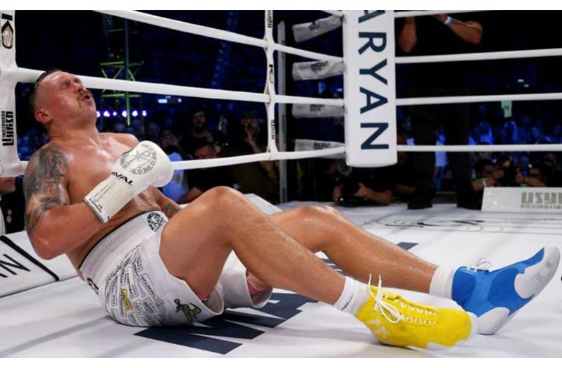 Oleksandr Usyk hit the canvas in round five claiming he had been hit with a low blow