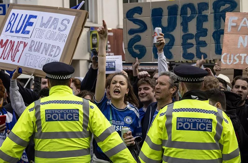 Chelsea fans celebrated outside Stamford Bridge after hearing the news, ending an earlier protest that had seen them block their team bus from entering the stadium prior to their match with Brighton.