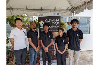 The Junior Chess team and their coach