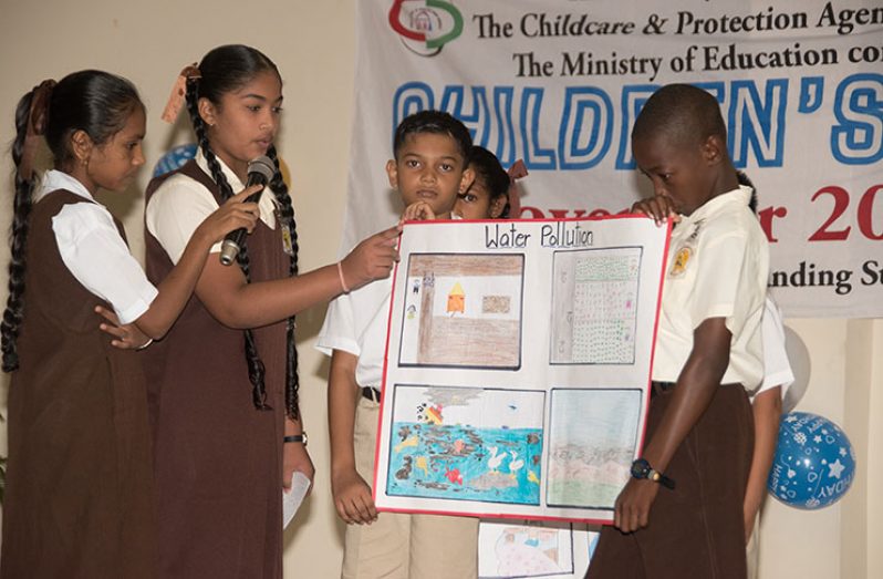Pupils of the C.V Nunes Primary School in Region Two explaining their problems to the audience at the Children’s Forum