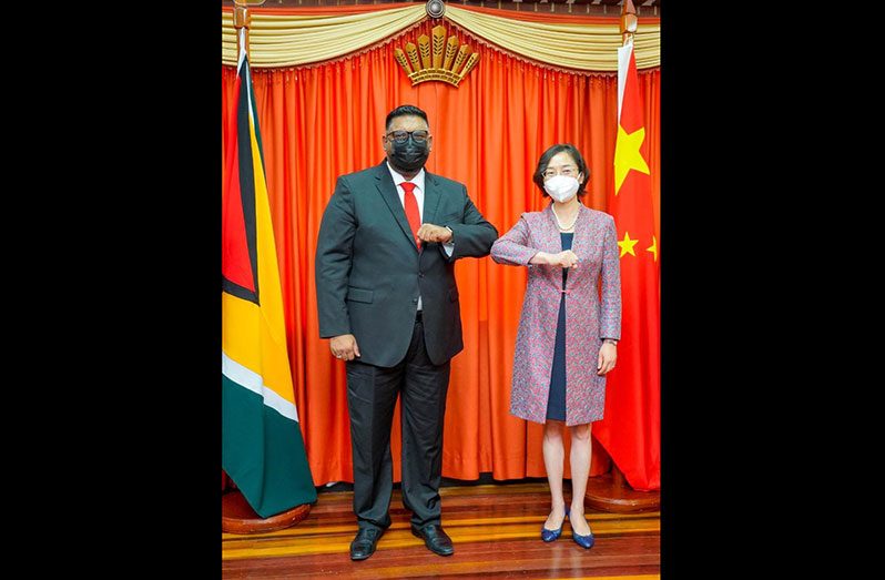 President Dr. Irfaan Ali with new Chinese Ambassador to Guyana, Guo Haiyan 