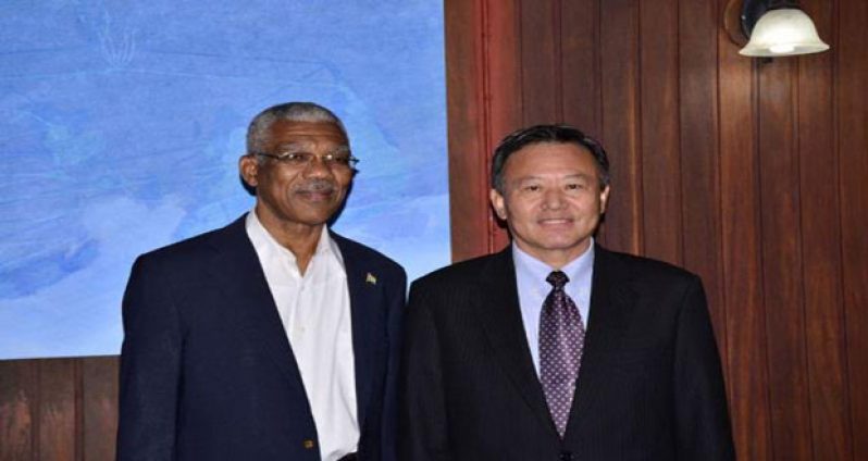 President David Granger and Ambassador Liu Huanxing, Special Envoy, Caribbean Affairs, Ministry of Foreign Affairs, China, taking a photo opportunity before the meeting at the Ministry of the Presidency, yesterday