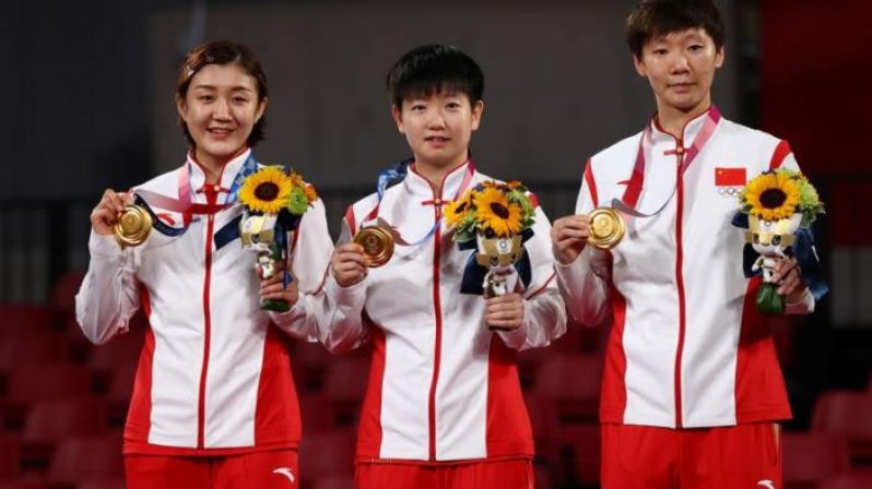 The Chinese women celebrate their table tennis gold.