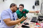 Dr. Wang Fei (right), an orthopedic surgeon and member of the 20th China Medical Team to Guyana, and GPHC orthopedic surgeon, Dr. Marillo (left) are having a pre-operative discussion