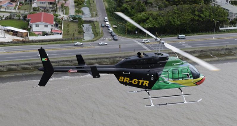 The Air Services Limited "Jubilee" helicopter is seen flying across the East Coast (Air Services Limited photo)