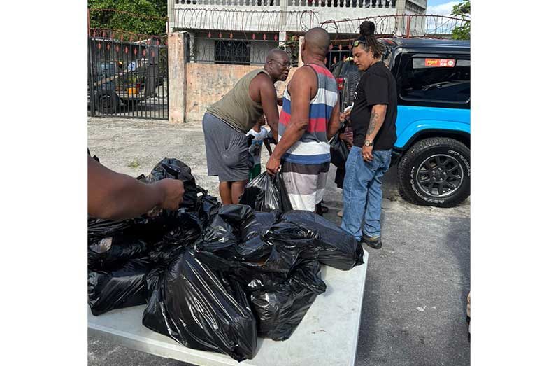 Businessman and gold miner Paul Chow in West Ruimveldt completed his week- long breakfast sharing supplies that marked one phase of his annual holiday goodwill tradition