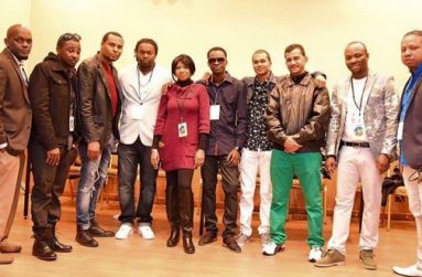 Chris and Michael (third and fourth from right) with representatives of HUGE Entertainment.