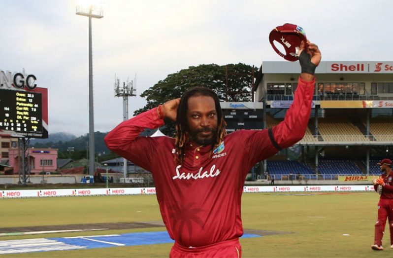 Chris Gayle acknowledges the crowd at Queen’s Park Oval.