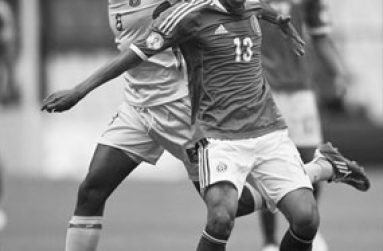 Chris Nurse battles Mexico’s Severo Maza at the Azteca Stadium during Guyana’s FIFA World Cup Qualification tournament.