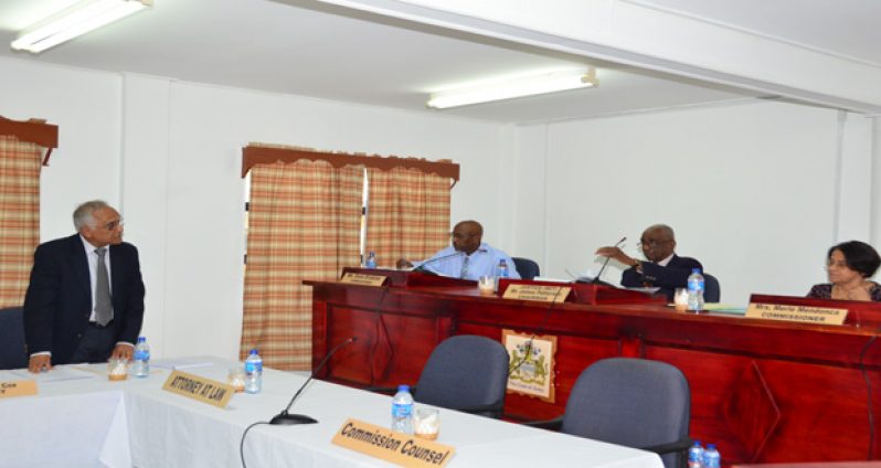 Head of the Bar Association,
Head of the Bar Association, Attorney Christopher Ram, puts forward the association’s application for full
participatory rights to commissioners of the CoI into the Georgetown Prison riots on Friday at the Ministry of Public
Service, Waterloo Street. Also in photo from left to right are: Commissioner Dale Erskine, Chairman Justice James
Patterson and Commissioner Merle Mendonca