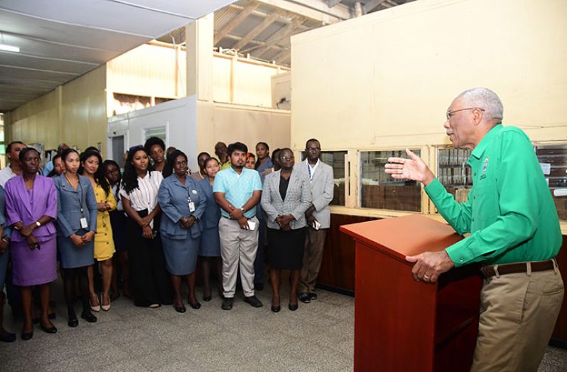 Staff of the Guyana Chronicle listening keenly to President David Granger
