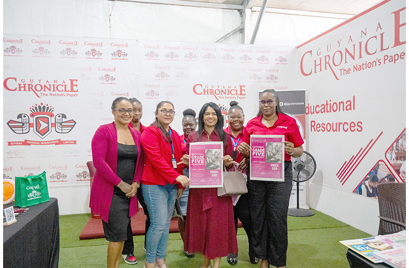Minister of Education Sonia Parag, along with the Guyana Chronicle Team at their Building Expo booth on Thursday (Elton John photo)