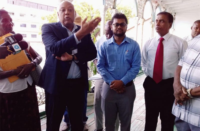 Minister Trotman (at left) with Mayor Ubraj Narine (at centre) and PPP Councillor, Bishram Kuppen