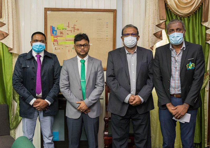 Ministers of Local Government and Regional Development, Nigel Dharamlall (left) and Anand Persaud (second from right) with Georgetown Mayor, Ubraj Narine (second from left) and Deputy Mayor, Alfred Mentore (DPI photo)