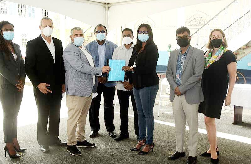 FLASHBACK: Minister of Local Government and Regional Development, Nigel Dharamlall; Minister within the Ministry of Local Government and Regional Development, Anand Persaud; Mayor Ubraj Narine and other officials following the signing of the $780M contract at City Hall in September
